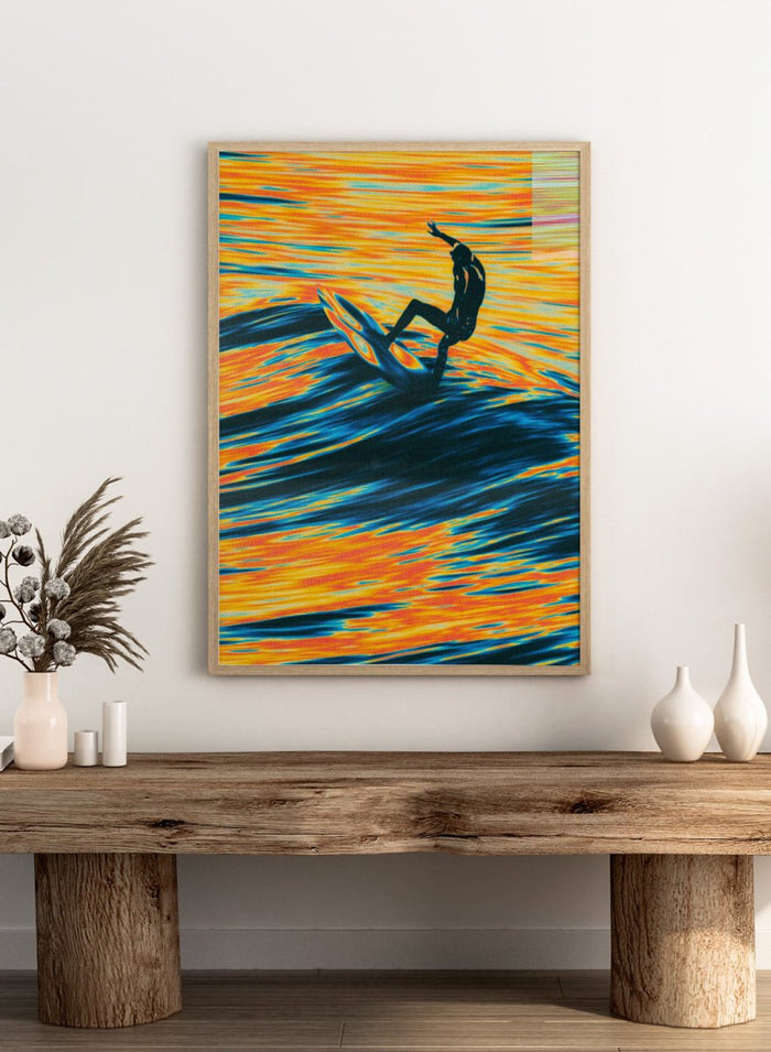 Artistic depiction of a surfer on a wave with vibrant orange and blue colors. Surf Trip by Taudalpoi surreal psychedelic surf art print with glowing ocean waves and lone surfer, retro cosmic collage poster wall art.