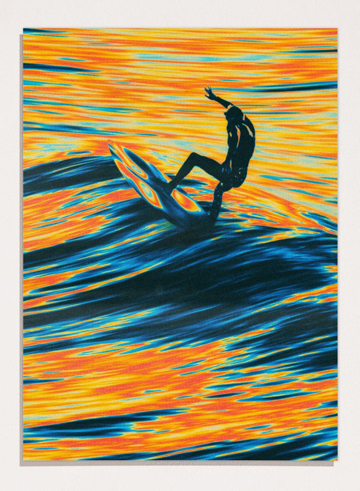 Artistic depiction of a surfer on a wave with vibrant orange and blue colors. Surf Trip by Taudalpoi surreal psychedelic surf art print with glowing ocean waves and lone surfer, retro cosmic collage poster wall art.