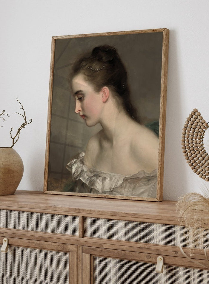 The Debutant by Gustave Jean Jacquet is a vintage portrait print of a young woman in profile with pearls in her hair and a white ruffled dress.