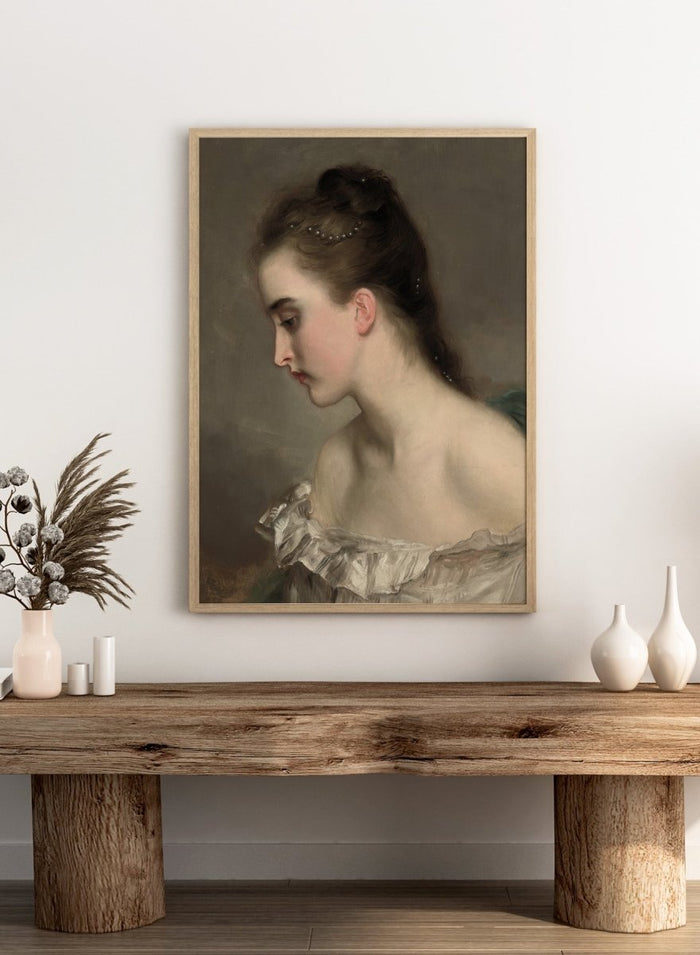 The Debutant by Gustave Jean Jacquet is a vintage portrait print of a young woman in profile with pearls in her hair and a white ruffled dress.