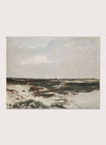 A framed landscape painting depicting a moody, overcast coastal scene with sandy dunes, dark water, and a cloudy sky. The Dunes at Camiers by Charles-François Daubigny is a vintage French coastal landscape print with sand dunes, grey skies, distant figures, and muted earth tones.