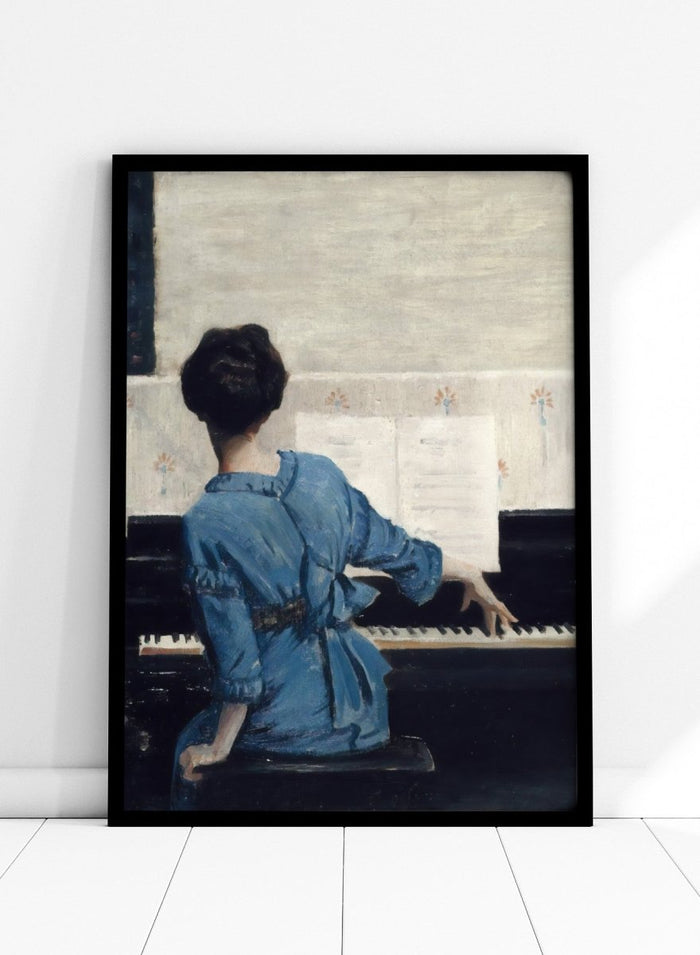 The Keynote by William Merritt Chase is a vintage piano print of a woman in a blue robe playing piano, a music room scene in soft blue tones.