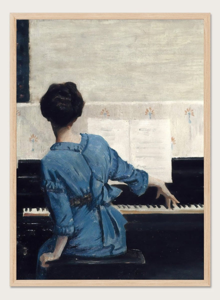 The Keynote by William Merritt Chase is a vintage piano print of a woman in a blue robe playing piano, a music room scene in soft blue tones.