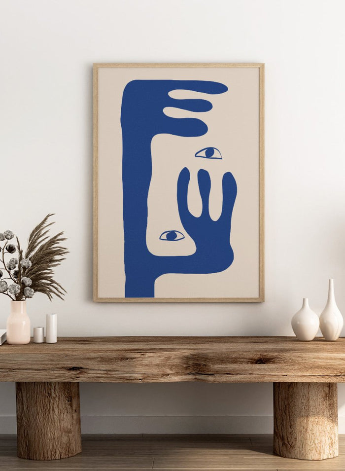 Abstract face art print by The MIUUS Studio featuring bold blue shapes and minimalist design. Contemporary modern wall art poster with graphic abstract portrait.