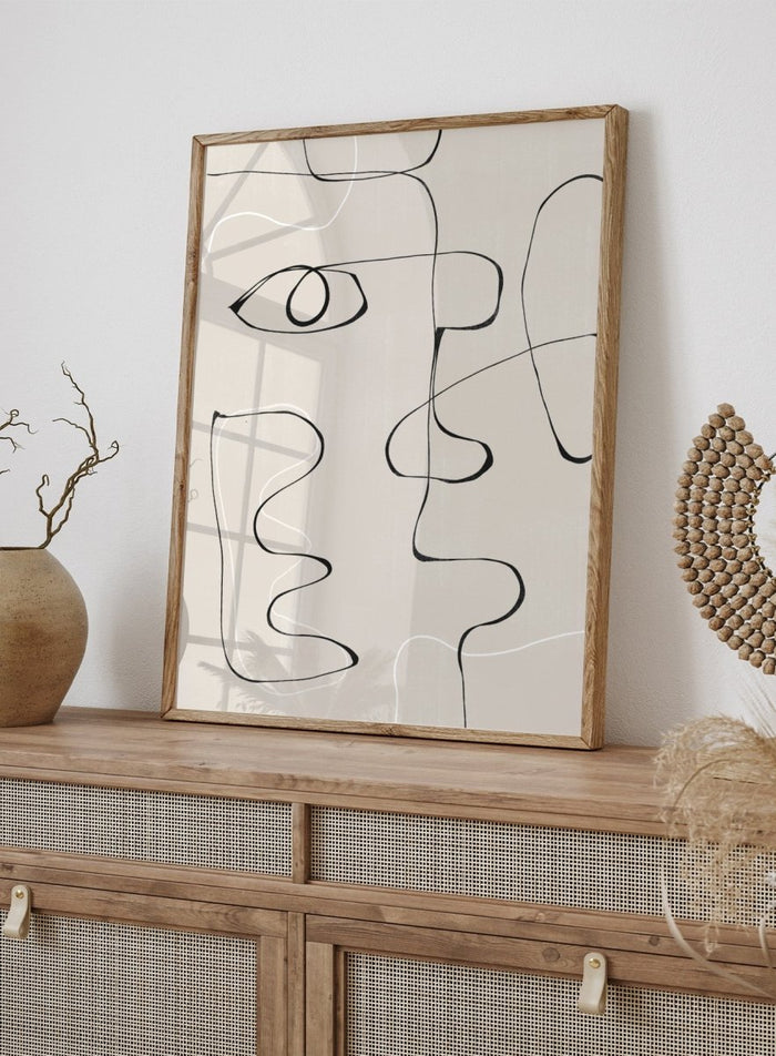 Abstract line art of a face on a beige background. Abstract Facescape by The MIUUS Studio is a minimalist abstract line art print and wall poster featuring continuous line drawing, modern face illustration, and neutral tones.