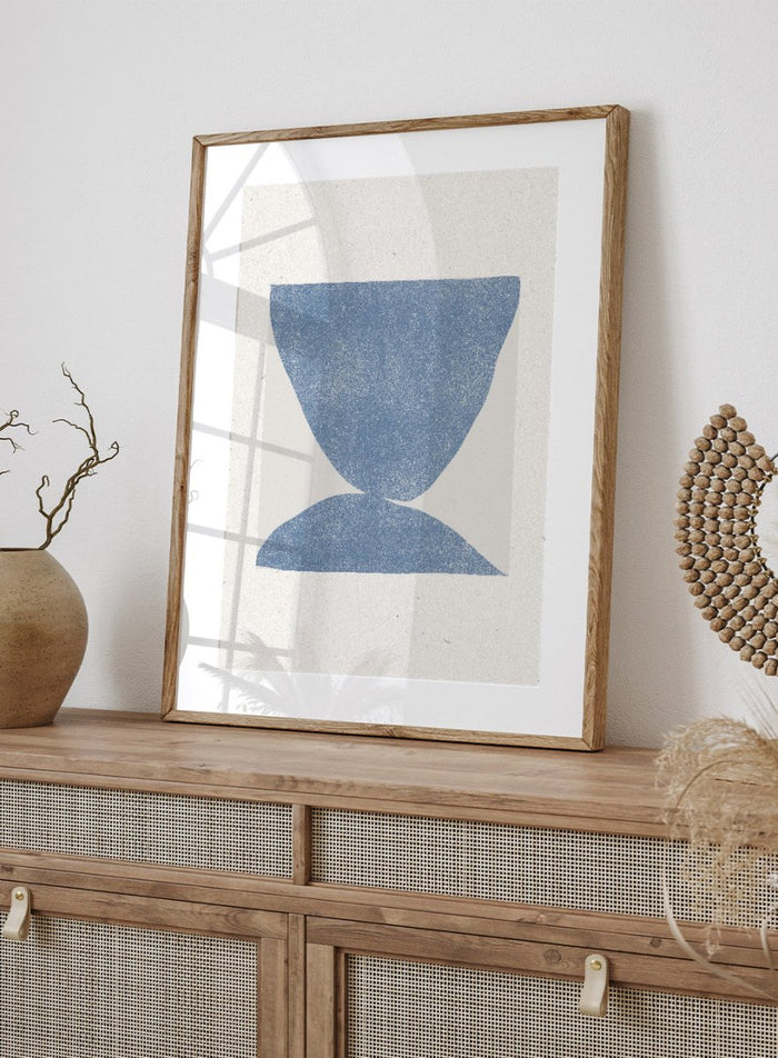Blue Symmetry by The MIUUS Studio is a modern abstract art print exploring balance, minimal form, and texture. Officially licensed fine art poster with optional framing.