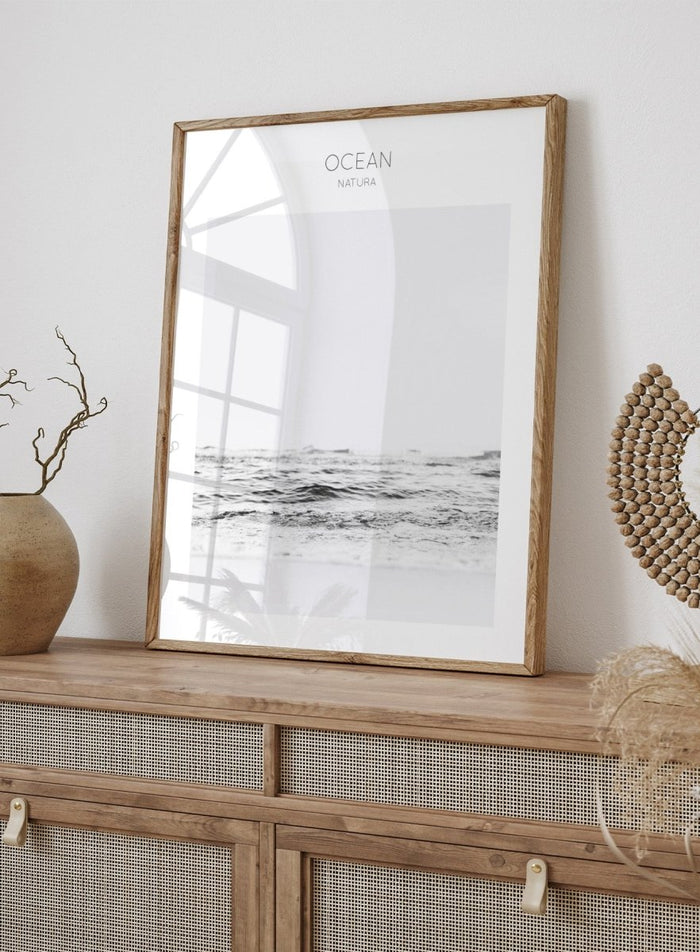 Black and white ocean wave with 'OCEAN Natura' text at the top. Endless Waves by The MIUUS Studio is a minimalist ocean photography art print and wall poster featuring soft waves, neutral tones, and modern coastal design.