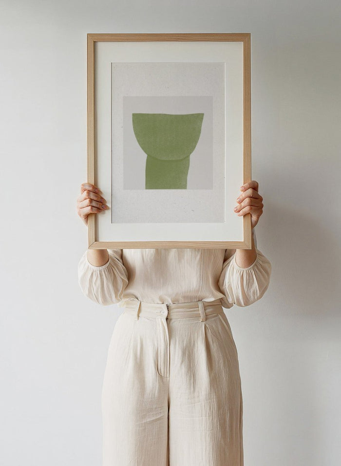 Verdant Tranquility art print by The MIUUS Studio. Minimalist abstract wall art poster in soft green tones, contemporary graphic design, fine art print.