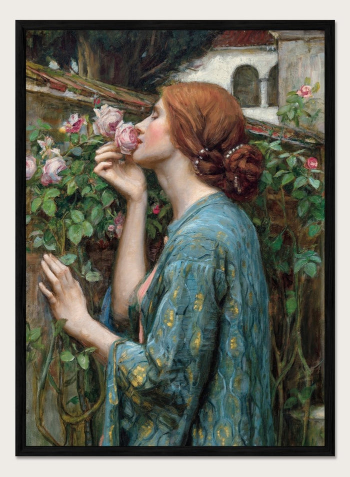 The Soul of the Rose by John William Waterhouse is a vintage floral print of a woman smelling roses in a garden, wearing a blue and gold gown.