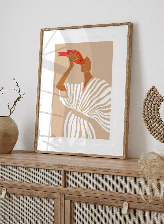 Fish Eye Paradox by Uma Gokhale is a figurative art print showing a woman holding a fish in an intimate portrait. Premium fine art print with real wood framing.