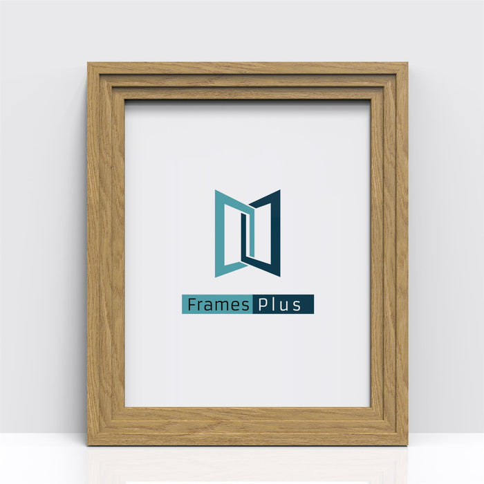 Oak picture and poster frame featuring a clean design with the Frames Plus logo.