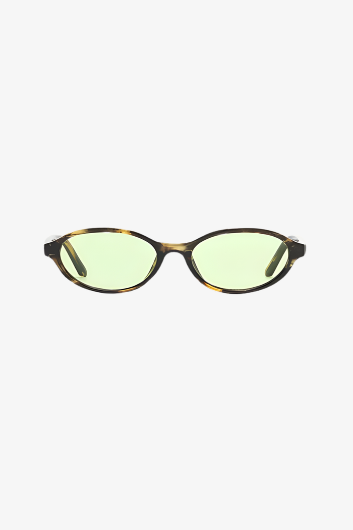 Sunglasses with green lenses and tortoiseshell frame on a white background